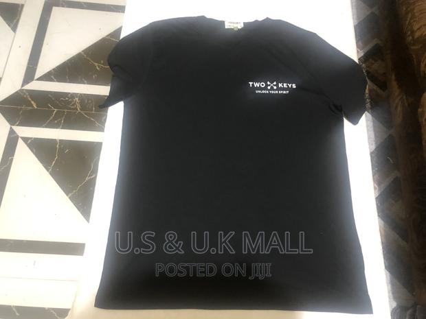 Large Black T- Shirts and Cap From America in Stock photo 6