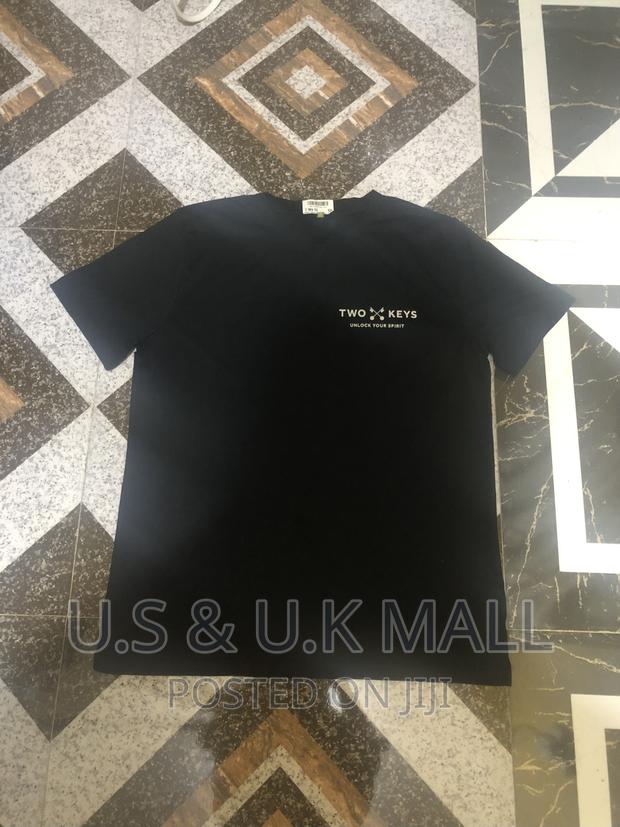 Large Black T- Shirts and Cap From America in Stock photo 5