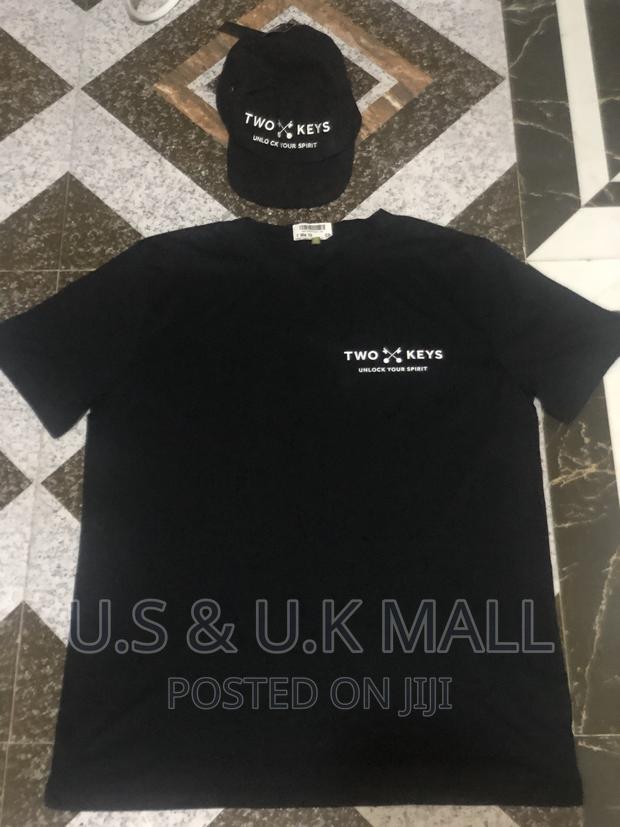 Large Black T- Shirts and Cap From America in Stock