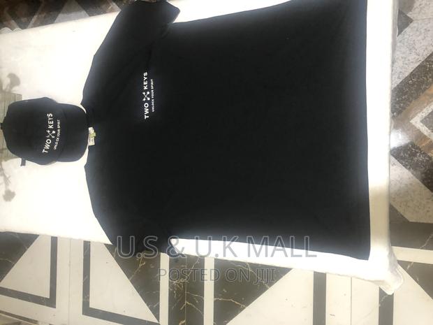 Large Black T- Shirts and Cap From America in Stock photo 2