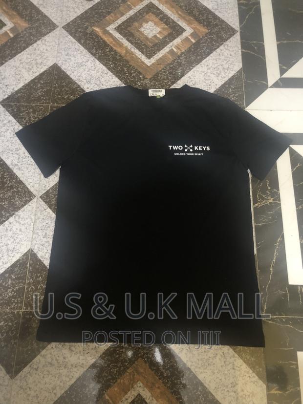 Large Black T- Shirts and Cap From America in Stock photo 3