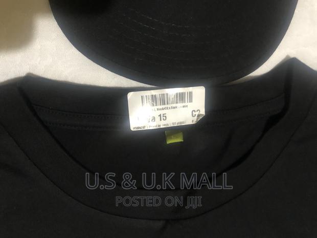 Large Black T- Shirts and Cap From America in Stock photo 8