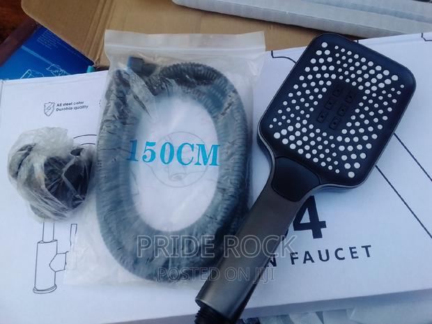 Hand Held Shower, Telephone Shower and Chain · Photo 2