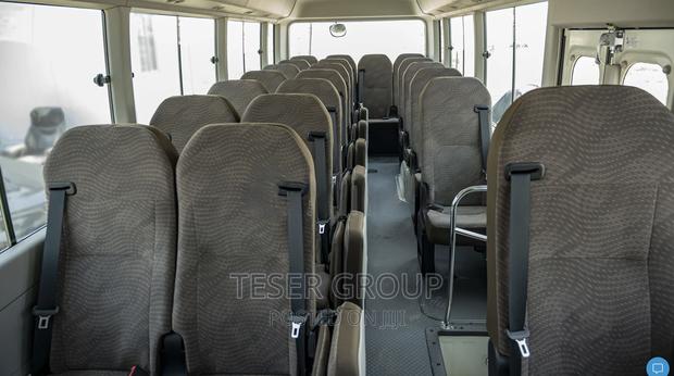 New Toyota Coaster 2023 Beige photo 6