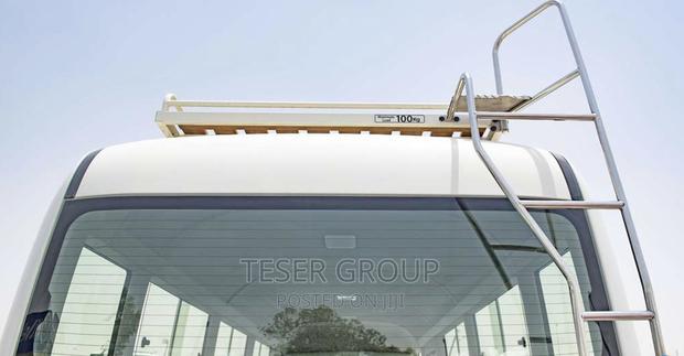 New Toyota Coaster 2023 Beige photo 5
