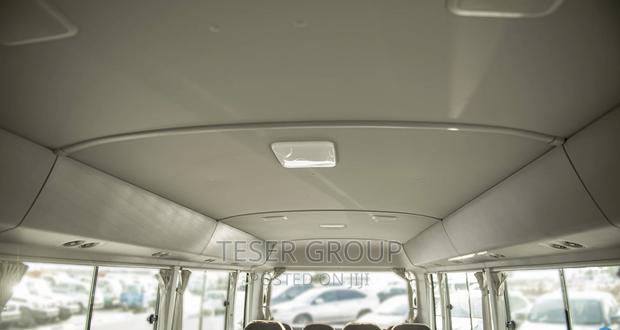 New Toyota Coaster 2023 Beige photo 8