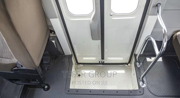 New Toyota Coaster 2023 Beige photo 13