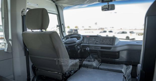 New Toyota Coaster 2023 Beige photo 9
