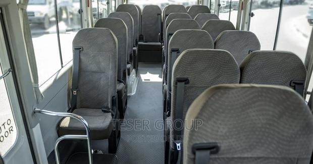 New Toyota Coaster 2023 Beige photo 14
