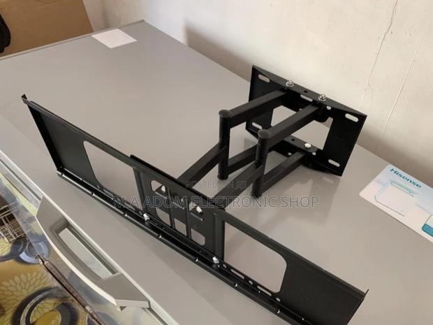Durable and Affordable Adjustable Double Arm Tv Mount · Photo 2