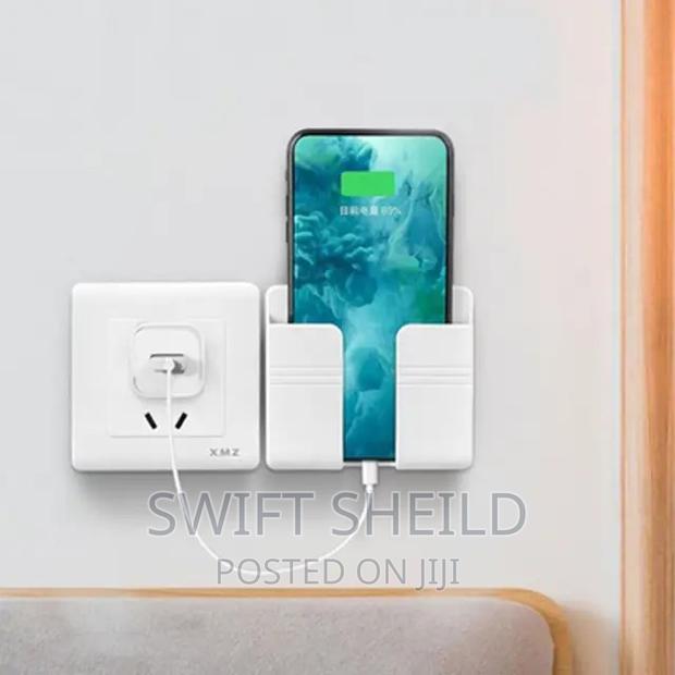 Adhesive Phone and Remote Wall Mount · Photo 4