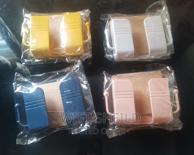 Adhesive Phone and Remote Wall Mount · Photo 3