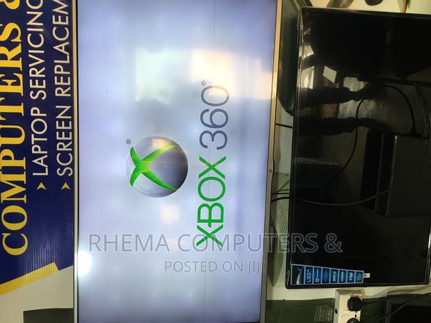 Xbox 360 Slim With 20 Crazy Games photo 6