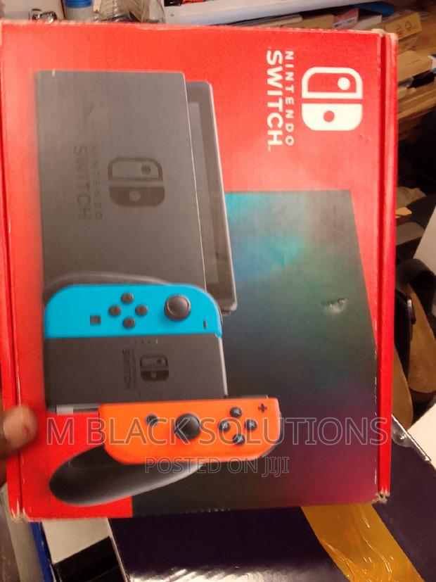 New Nintendo Switch With Blue and Red Joy-Con · Photo 3
