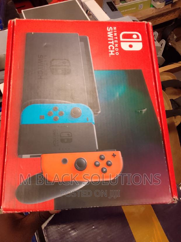 New Nintendo Switch With Blue and Red Joy-Con · Photo 4