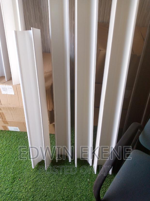 White PVC Rain Gutter and Down Pipe · Photo 2