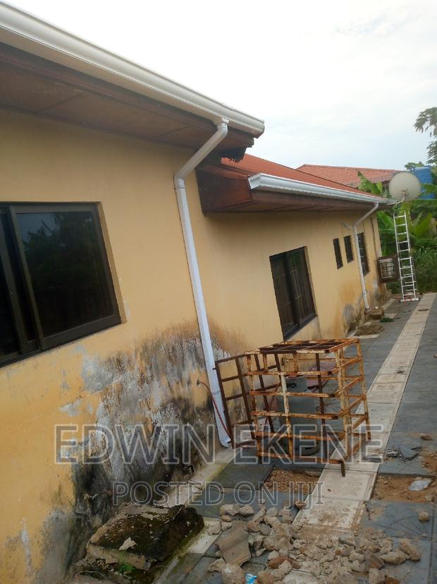 Rain Gutters and Downspouts · Photo 2