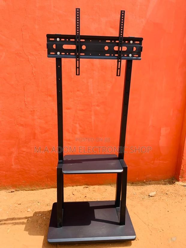 Brand New Mobile Tv Stand With Wheels for 32”-75” Tv · Photo 2