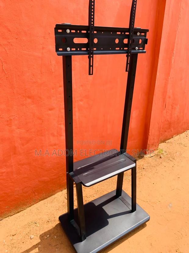 Long Lasting Mobile Tv Stand for 32”-75” Tv. · Photo 2