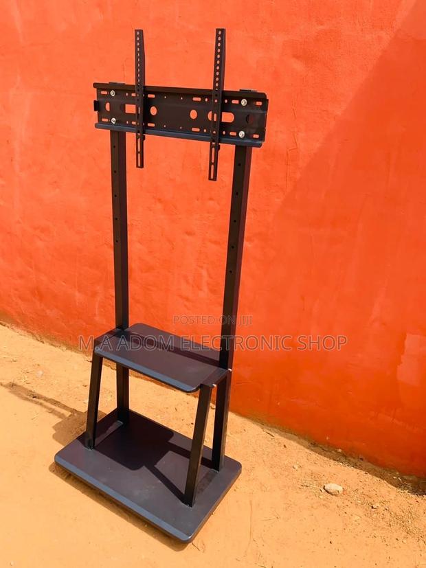 Stainless Steel Mobile Tv Stand With Wheels for 32”-75” Tv. · Photo 2