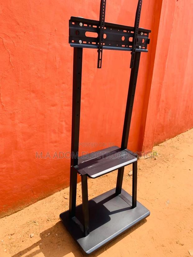 Anti-Rust Mobile Tv Stand With Wheels for 32” to 75” Tv · Photo 2
