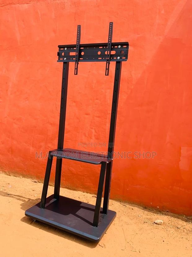 Fresh in Box Mobile Tv Stand With Wheels for 32”-75” Tv · Photo 2