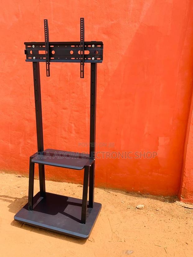 Newly in Stock Mobile Tv Stand With Wheels for 32”-75” Tv · Photo 2