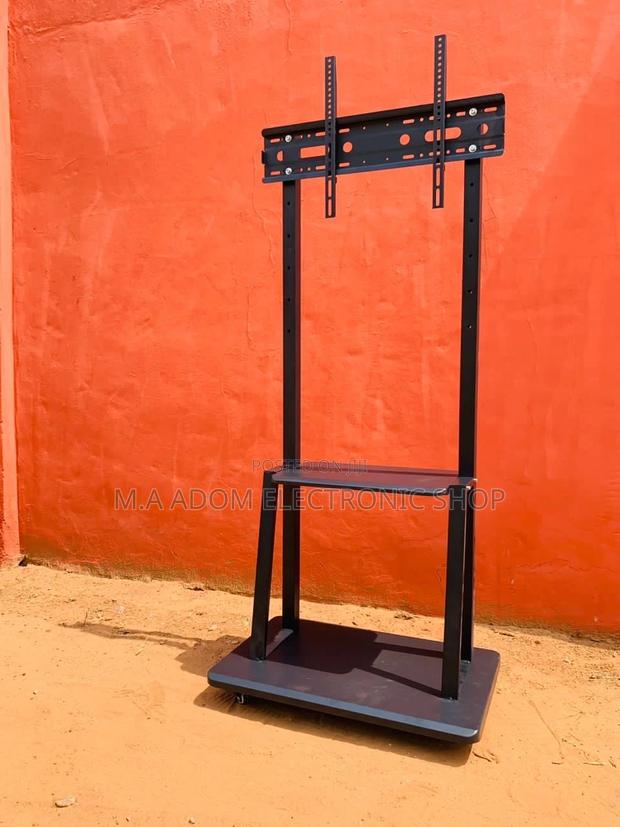 Quality Mobile Tv Stand With Wheels for 32”-75” Tv(Black). · Photo 2