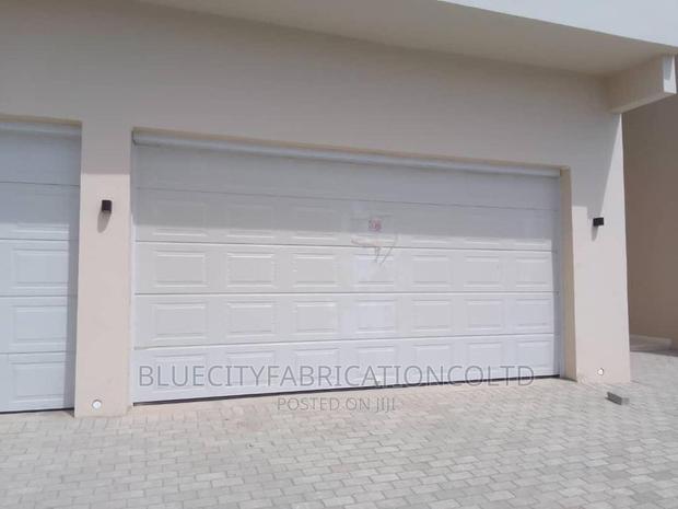 American Automated Garage Door 14ft X 8ft · Photo 3