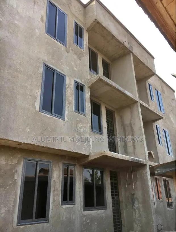 Aluminium Sliding Windows With Dark Glass photo 3