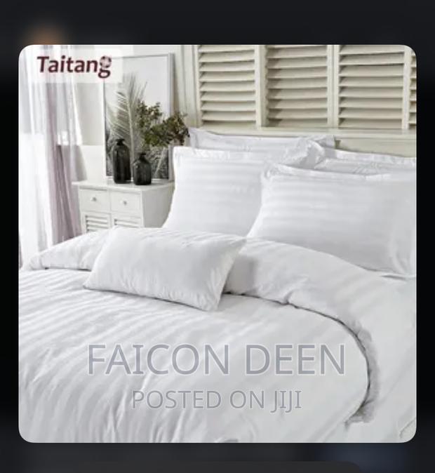Luxurious White Stripped Bedsheet With Pillow Cases · Photo 1