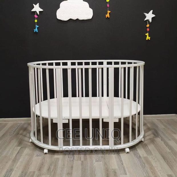Multifunctional Baby Crib or Cot · Photo 4