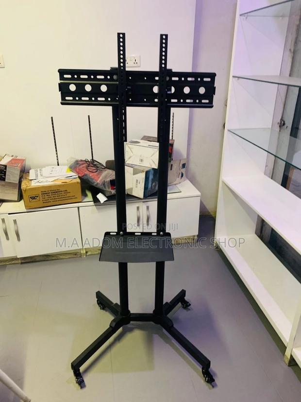 Durable and Affordable Moveable Tv Trolly for 32”-65”. · Photo 2