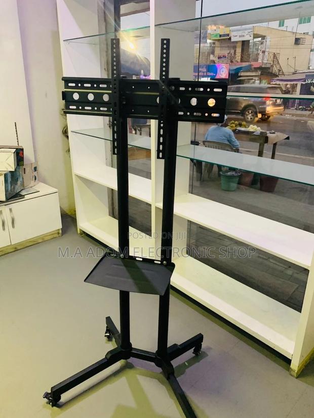 Sealed in Box Moveable Tv Trolly for 32”-65 Inch Tv,Black. · Photo 2