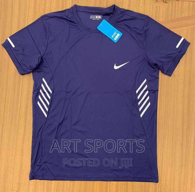 Nike Running Tops · Photo 3