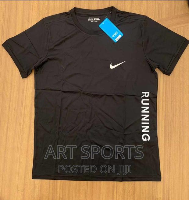 Nike Running Tops · Photo 4