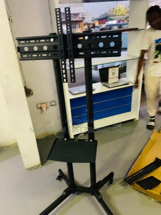 Purchase Authentic Moveable Tv Trolly for 32”-65 Inches. · Photo 2