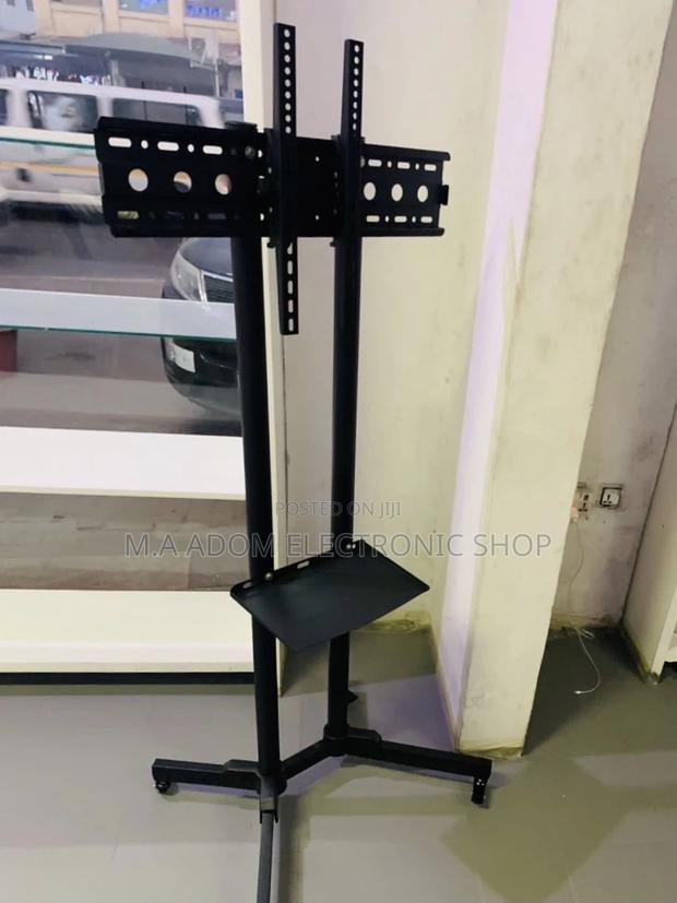 Shop Quality Moveable Tv Trolly for 32” to 65 Inch(Black). · Photo 2