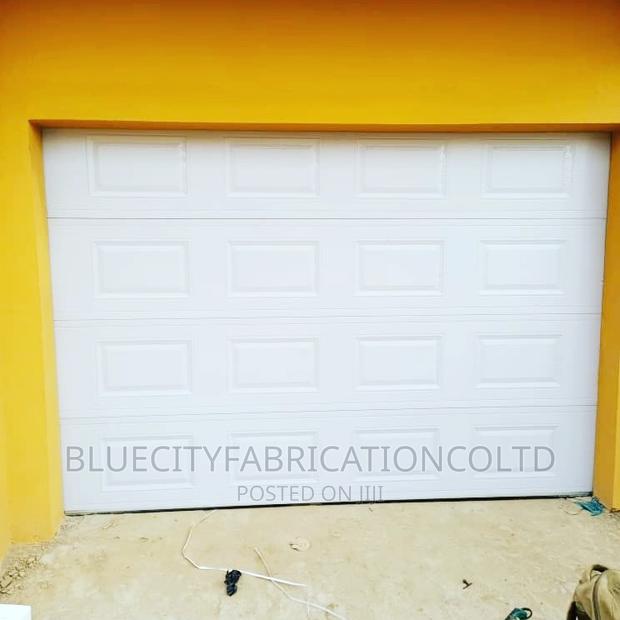 9*8ft Automatic Garage Door With Remote · Photo 3