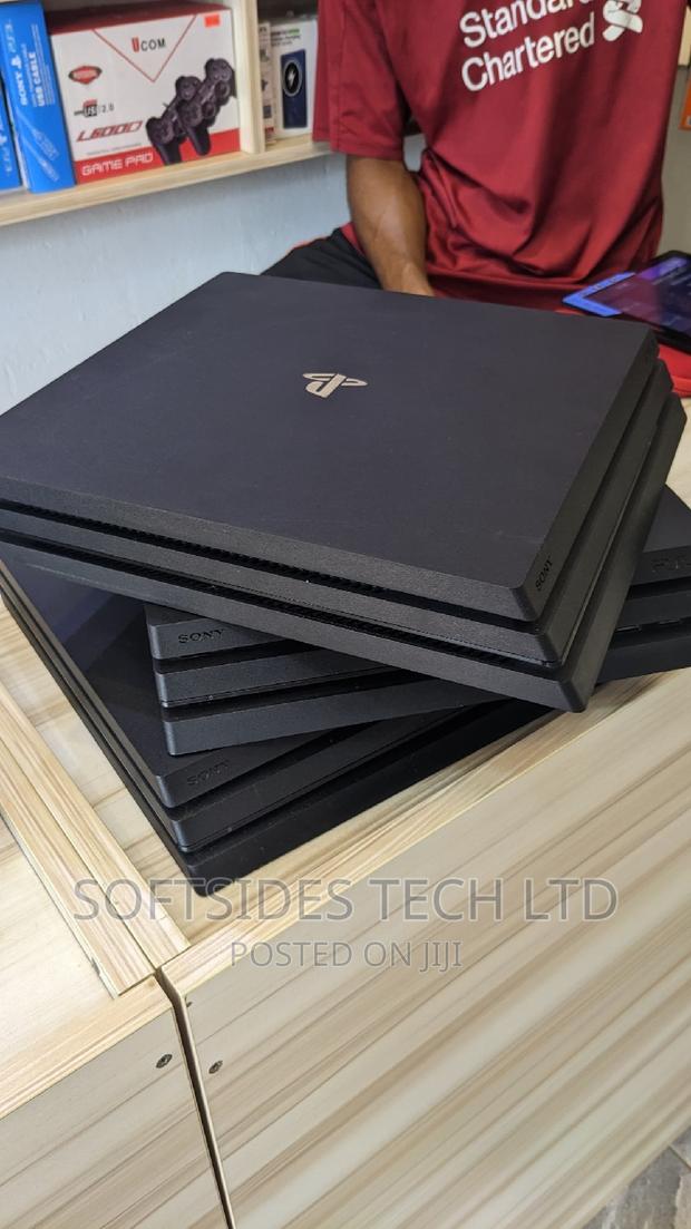 Playstation 4 Pro and Controller With Hdmi, Charger, · Photo 4