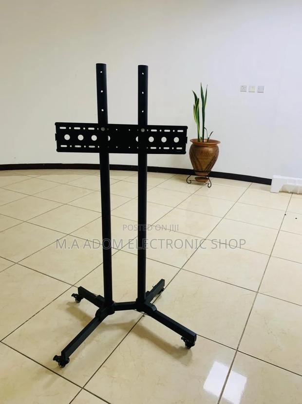 Stainless Steel Moveable Tv Trolly for 32” to 70”(Black). · Photo 2