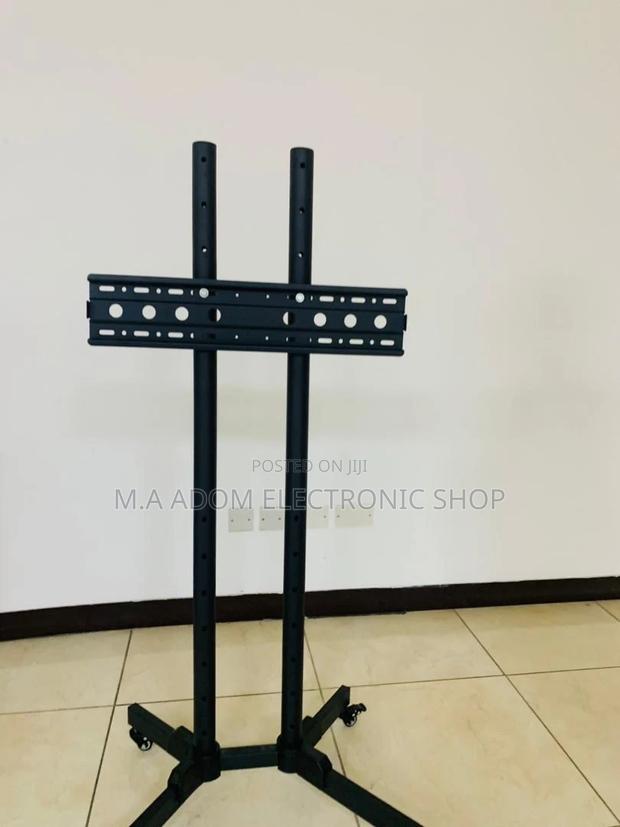 Long Lasting Moveable Tv Trolly for 32” to 70”(Black). · Photo 2