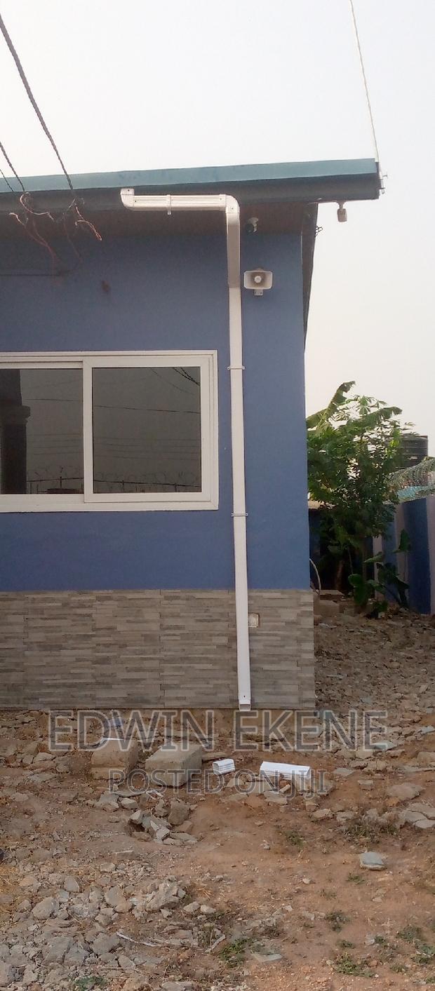 Installation of PVC Rain Gutters · Photo 2