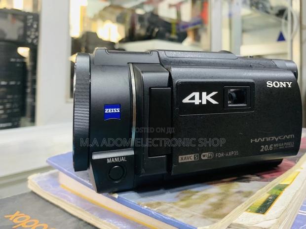 Brand New Sony FDR-AXP35 Camcorder + Built-in Project. · Photo 2