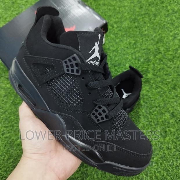 Original Nike Jordan 4 Triple Black · Photo 4