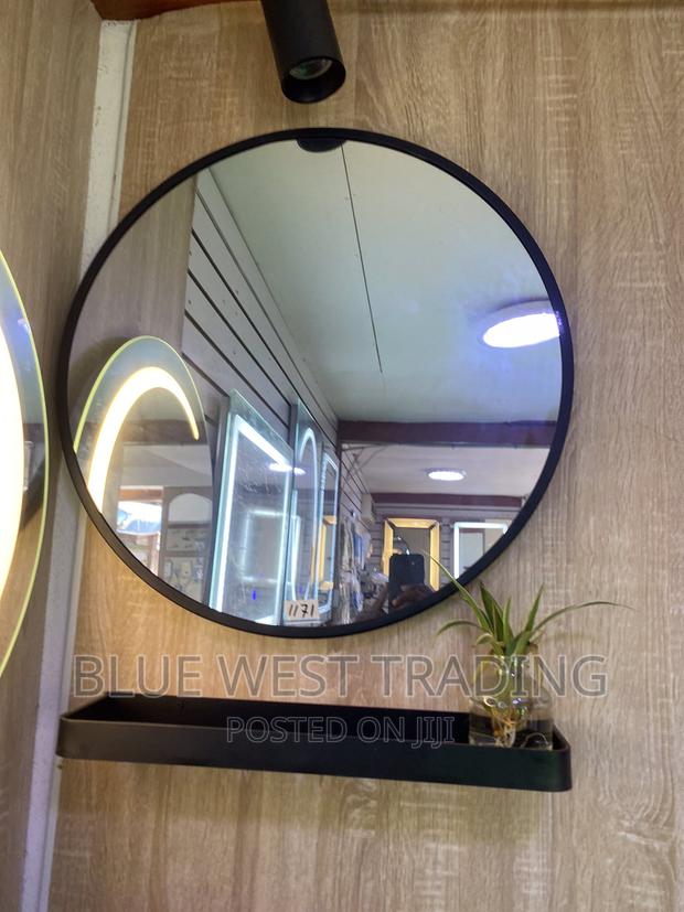 Decorative Round Miror With Black Shelves (60 CENTIMETERS) · Photo 4