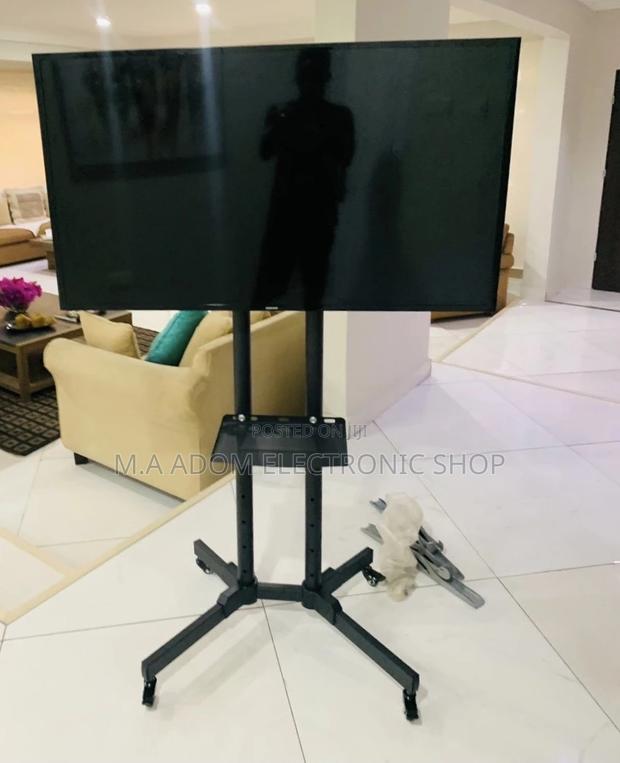 Sealed in Box Moveable Tv Trolly for 32”-70 Inch Tv(Black). · Photo 2