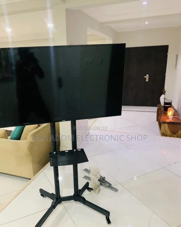 Classic Design Moveable Tv Trolly for 32”-70” Tv,Black. · Photo 2