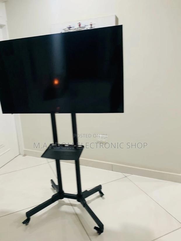 Purchase Adorable Moveable Tv Trolly for 32” - 70 Inch Tv. · Photo 2