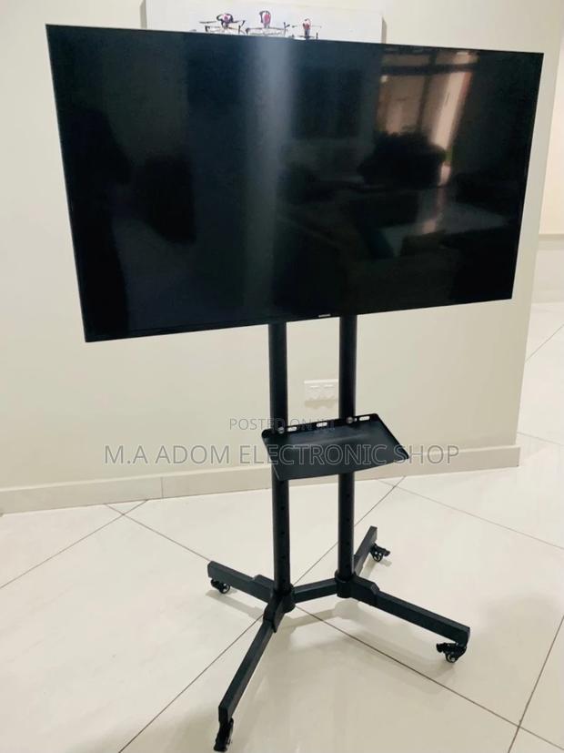 Stainless Steel Moveable Tv Trolly for 32”-70” Tv,Black. · Photo 2